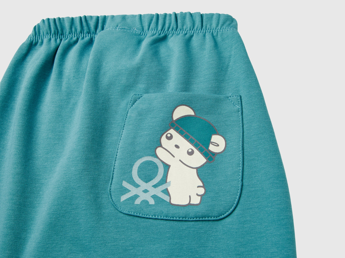 Pantaloni in calda felpa con taschino