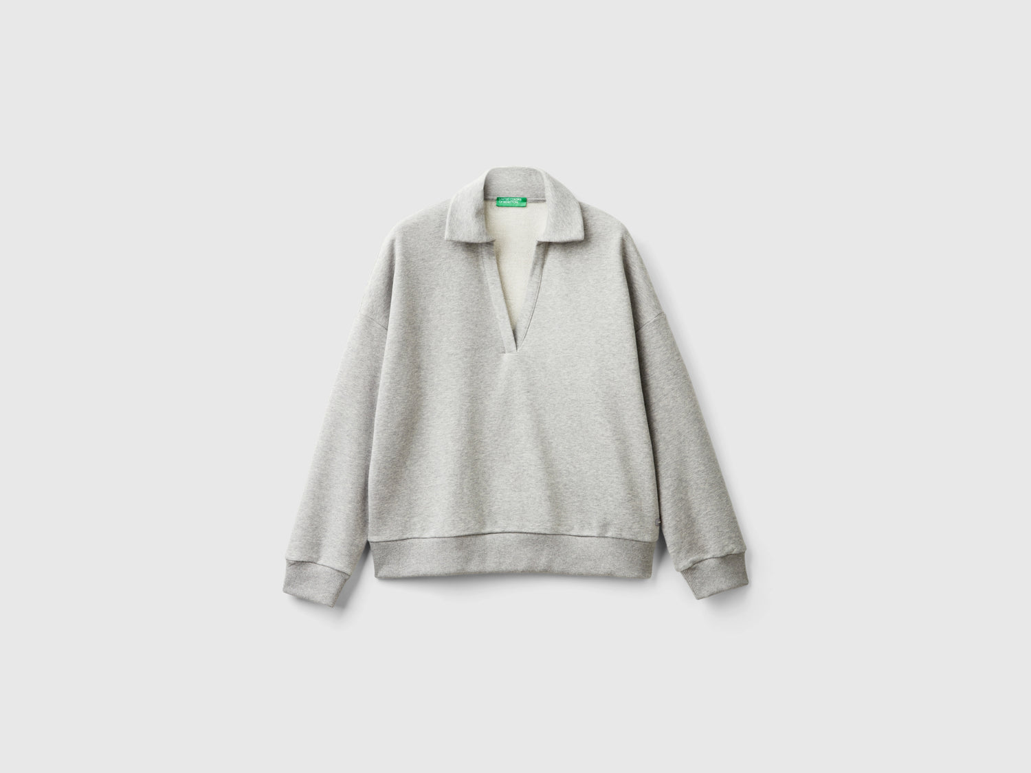 Polo in felpa con scollo a V da donna grigio chiaro | Benetton Outlet