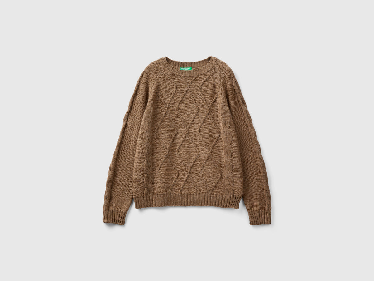 Maglione con trecce e losanghe