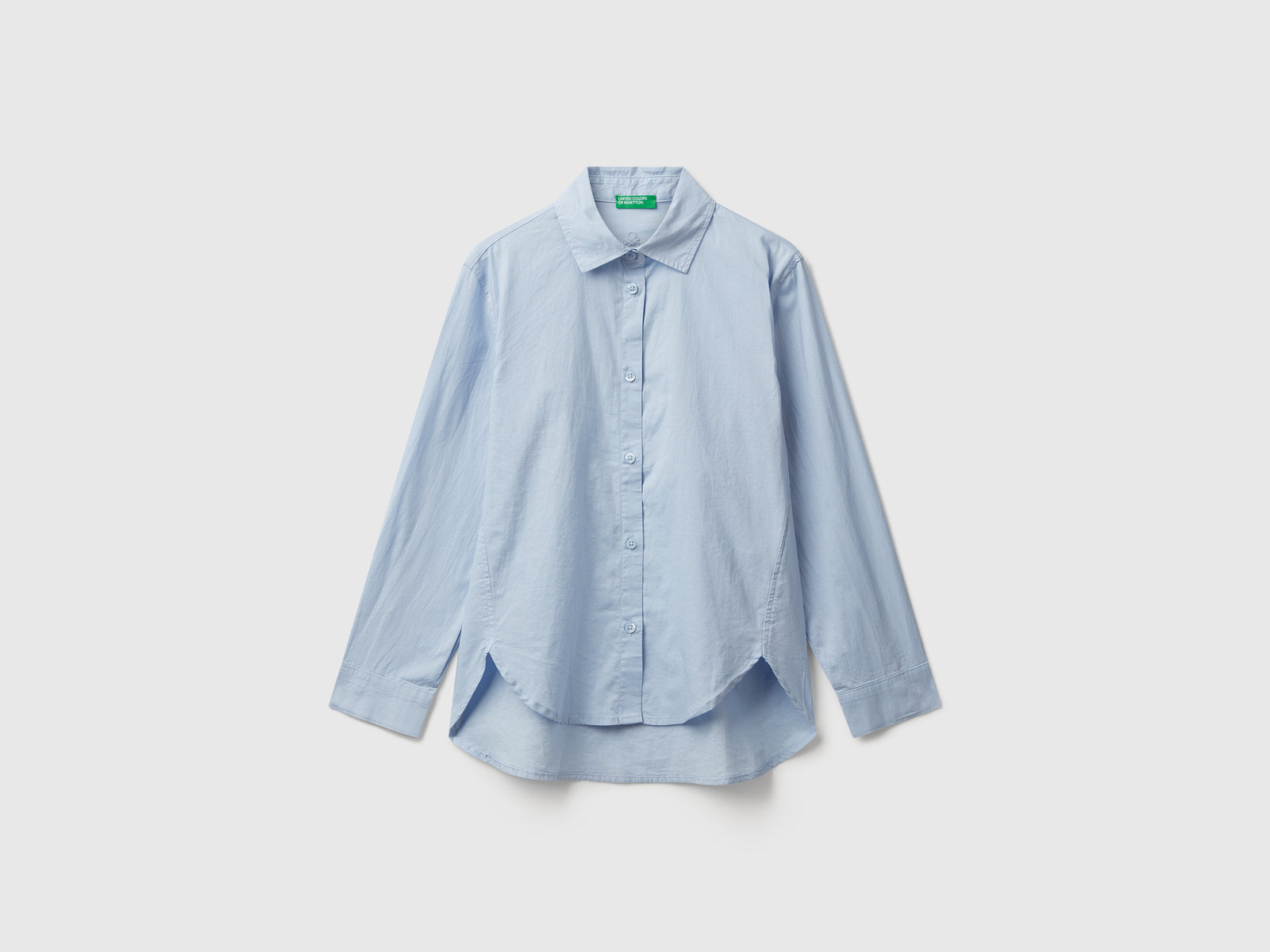 Camicia over fit da bambina azzurro | Benetton Outlet