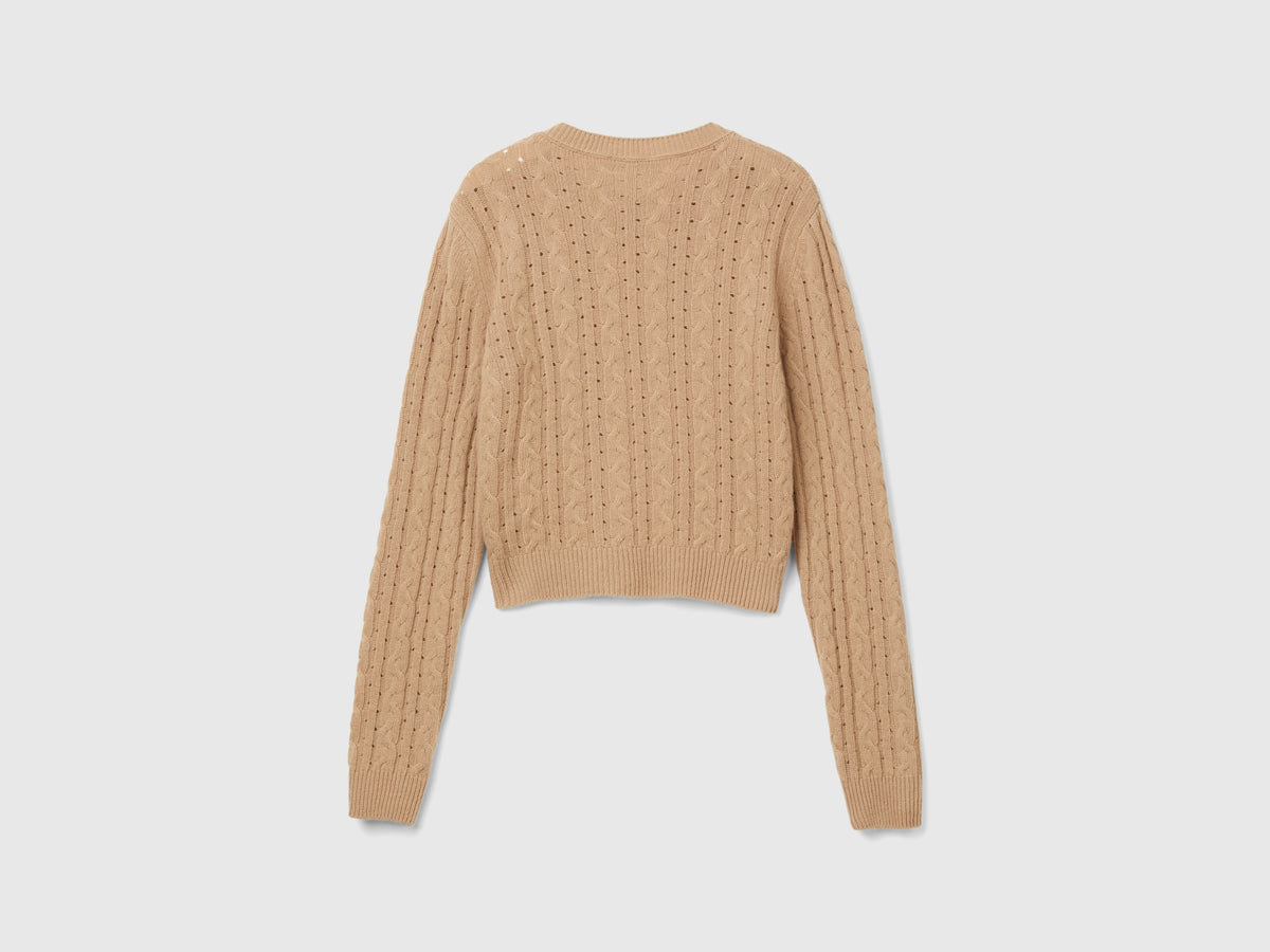 Maglia cropped con trecce e trafori