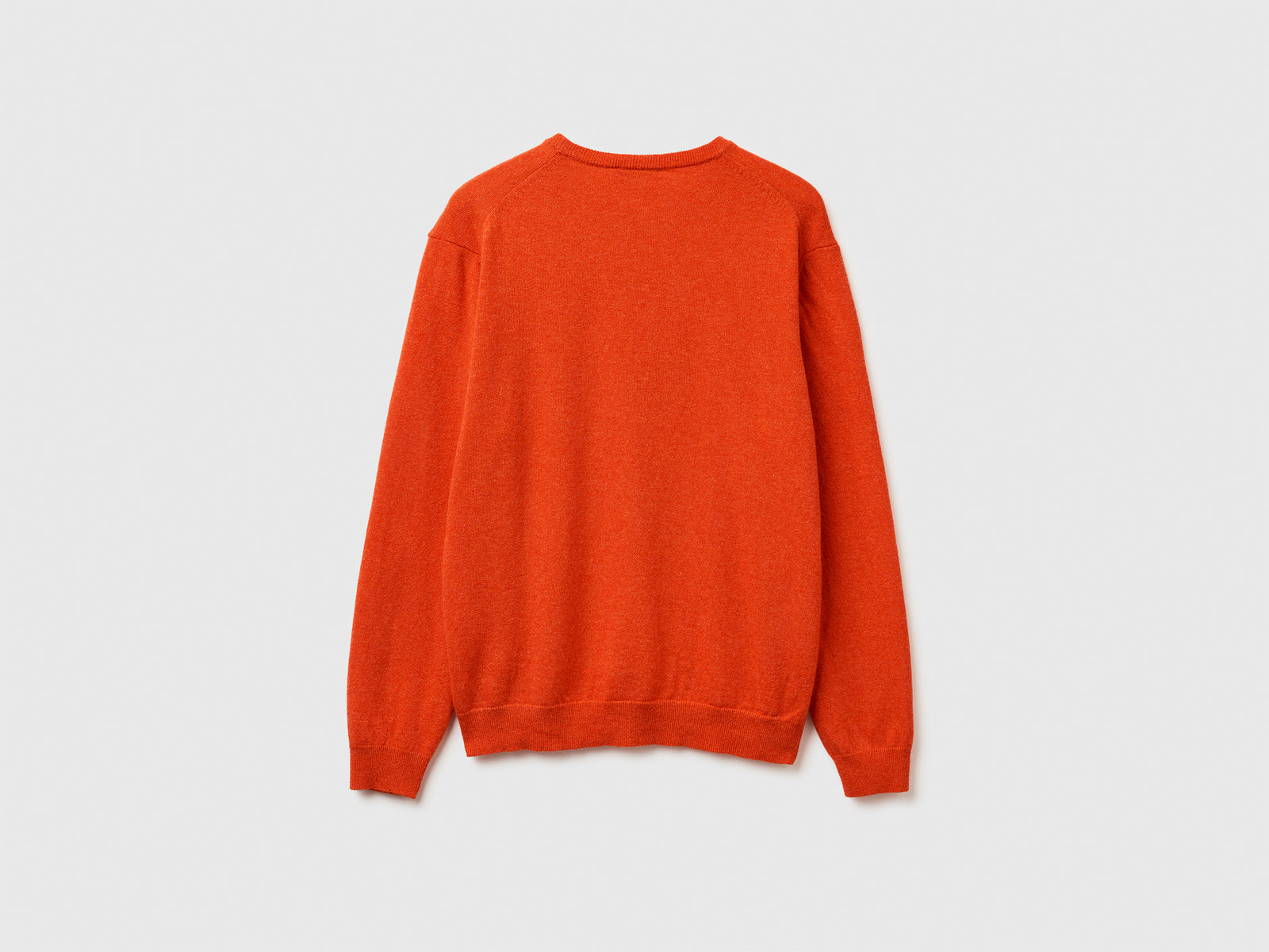 Maglia girocollo mélange in pura lana Merino da uomo arancione 2 | Benetton Outlet