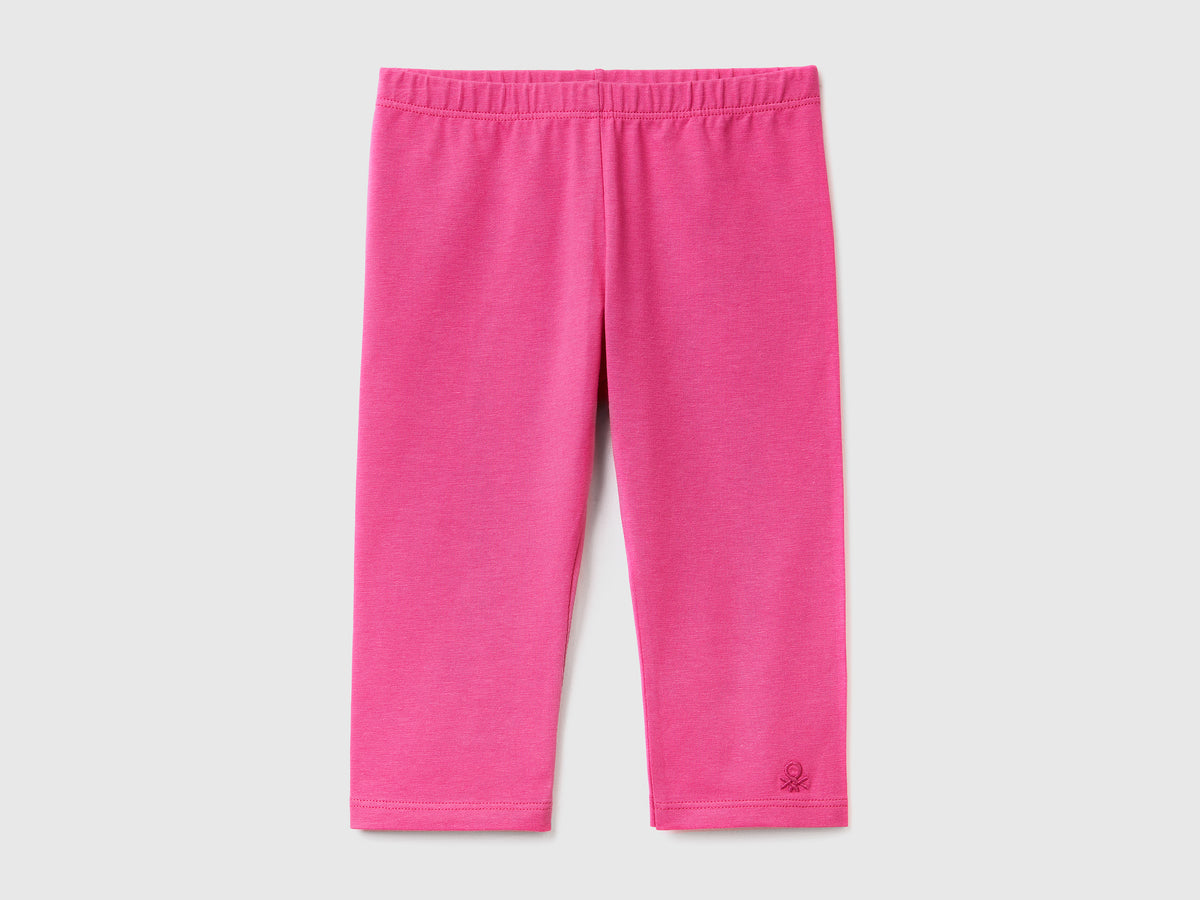 Leggings in cotone stretch con gamba a 3/4 da bimba fucsia | Benetton Outlet