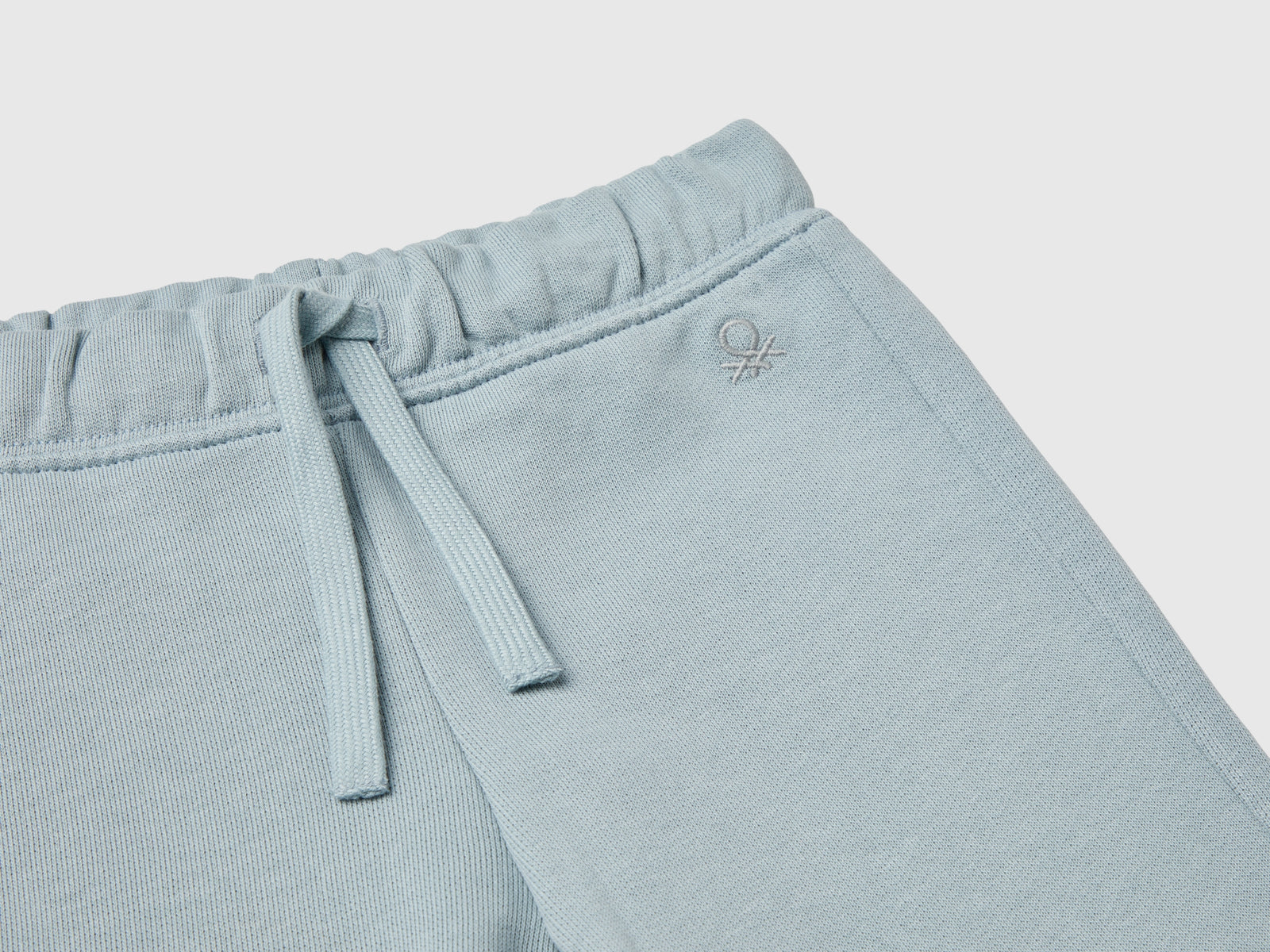 Pantaloni in felpa di cotone bio da bimba grigio perla 3 | Benetton Outlet