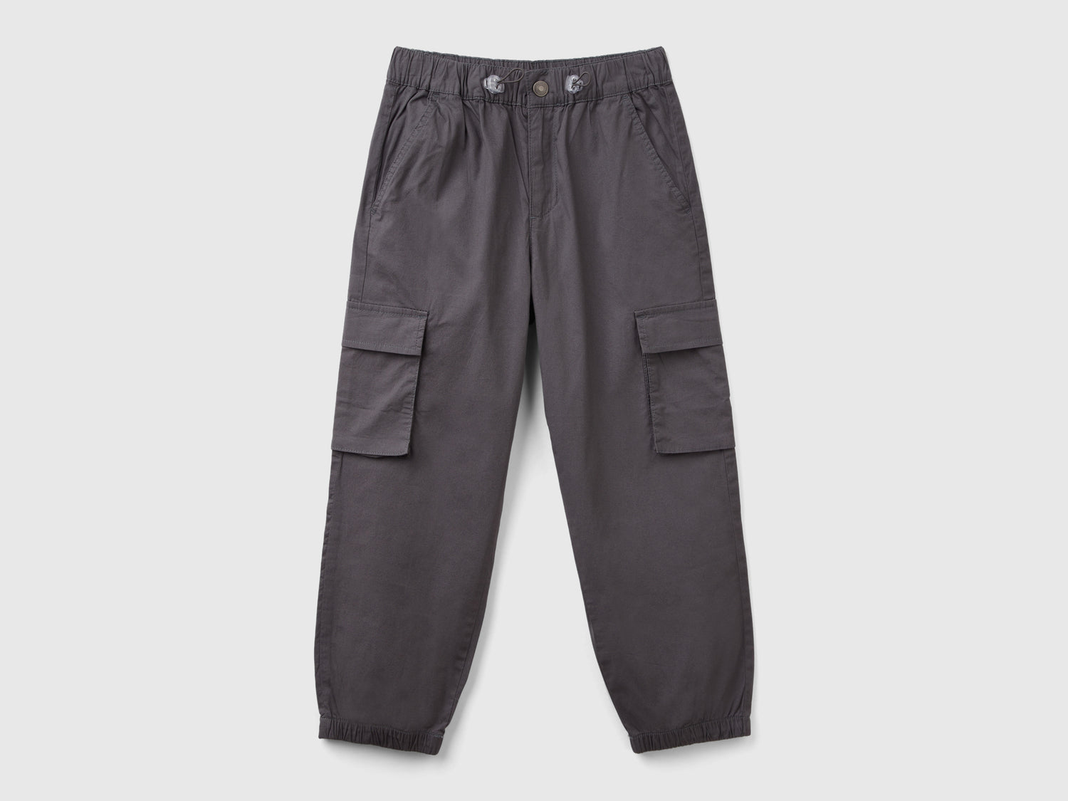 Pantaloni parachute in cotone stretch da bambino grigio scuro | Benetton Outlet