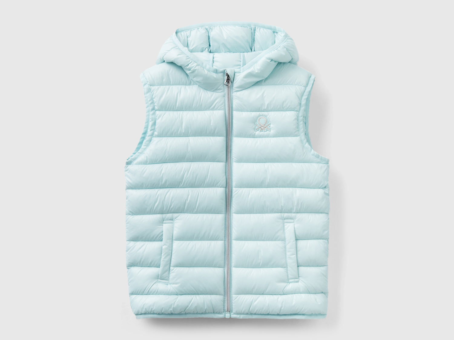 Gilet imbottito con cappuccio da bambina azzurro | Benetton Outlet