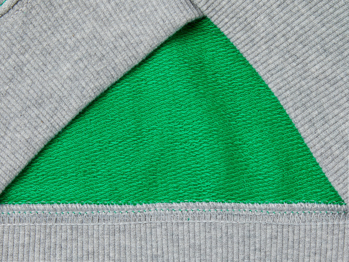 Felpa con zip e ricamo logo