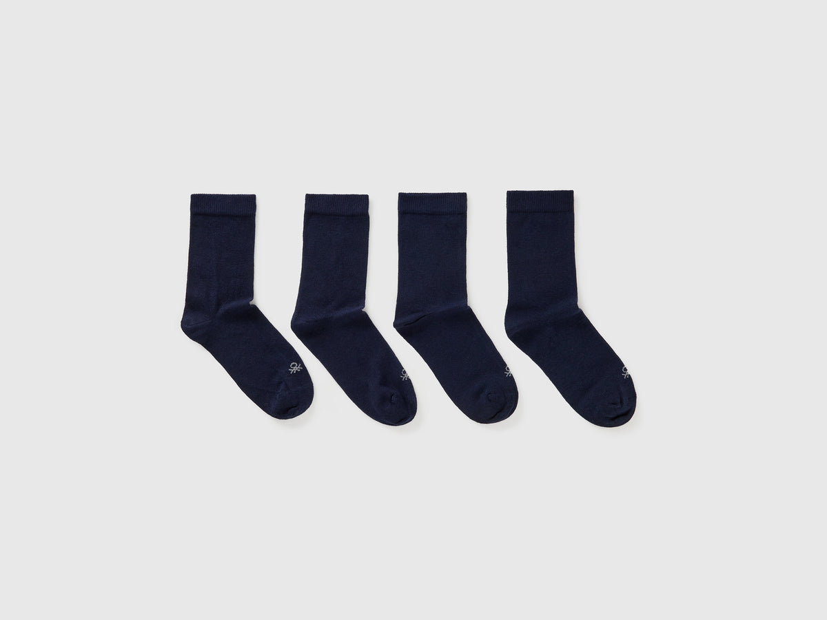 Quattro paia di calze in cotone  stretch da bambino blu scuro | Benetton Outlet