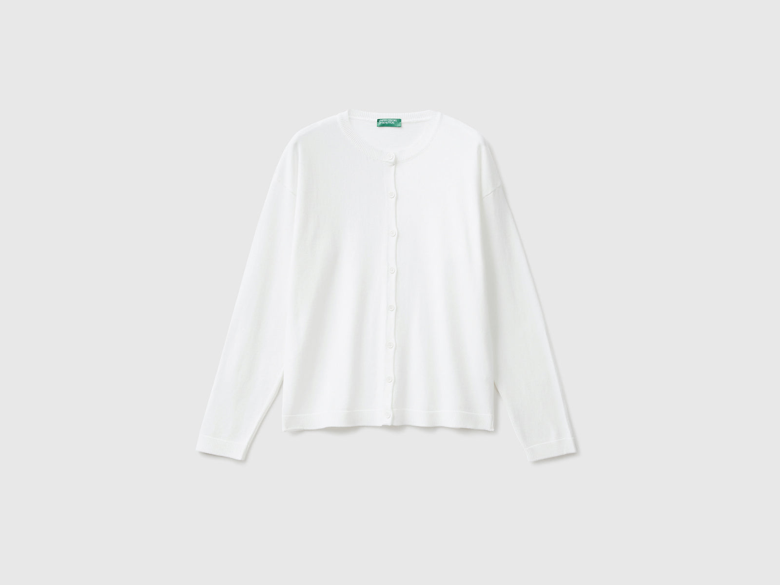 Cardigan girocollo con bottoni da donna bianco panna | Benetton Outlet