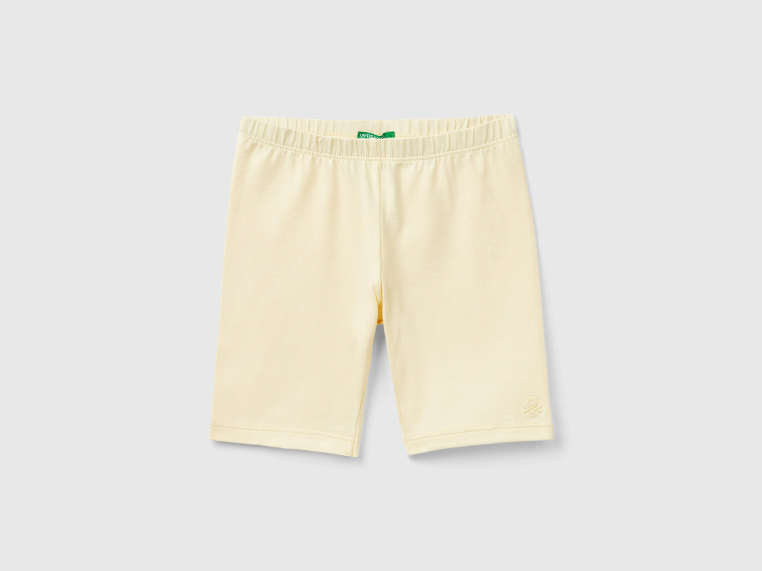 Leggings corti ciclista da bimba giallo | Benetton Outlet