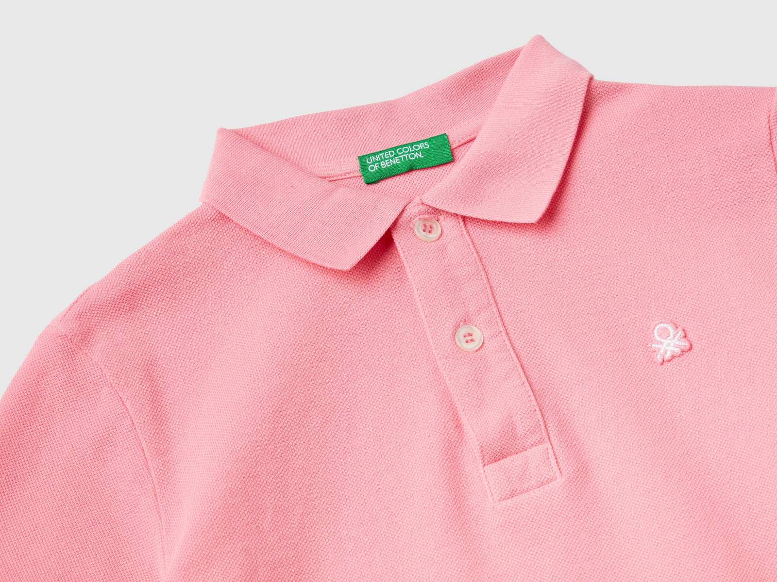 Polo slim fit 100% cotone da bambino rosa 2 | Benetton Outlet