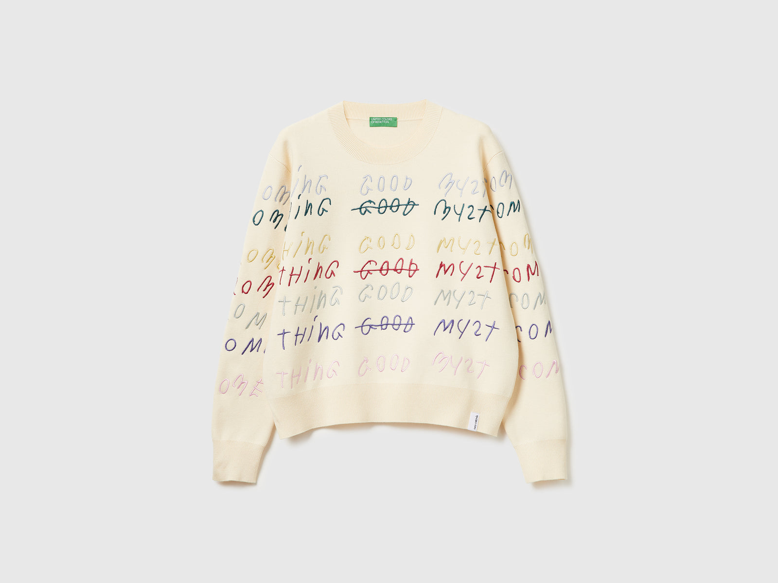 Maglia con ricamo Coco Capitán da donna bianco panna | Benetton Outlet