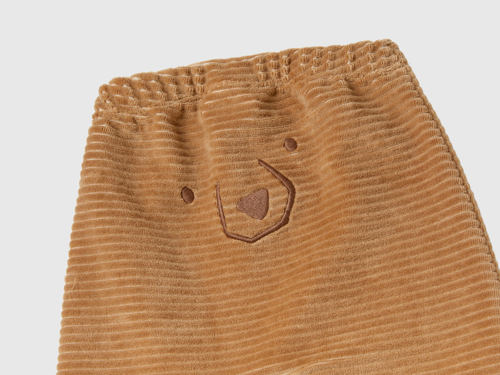 Pantaloni in ciniglia con ricamo da neonato cammello 3 | Benetton Outlet