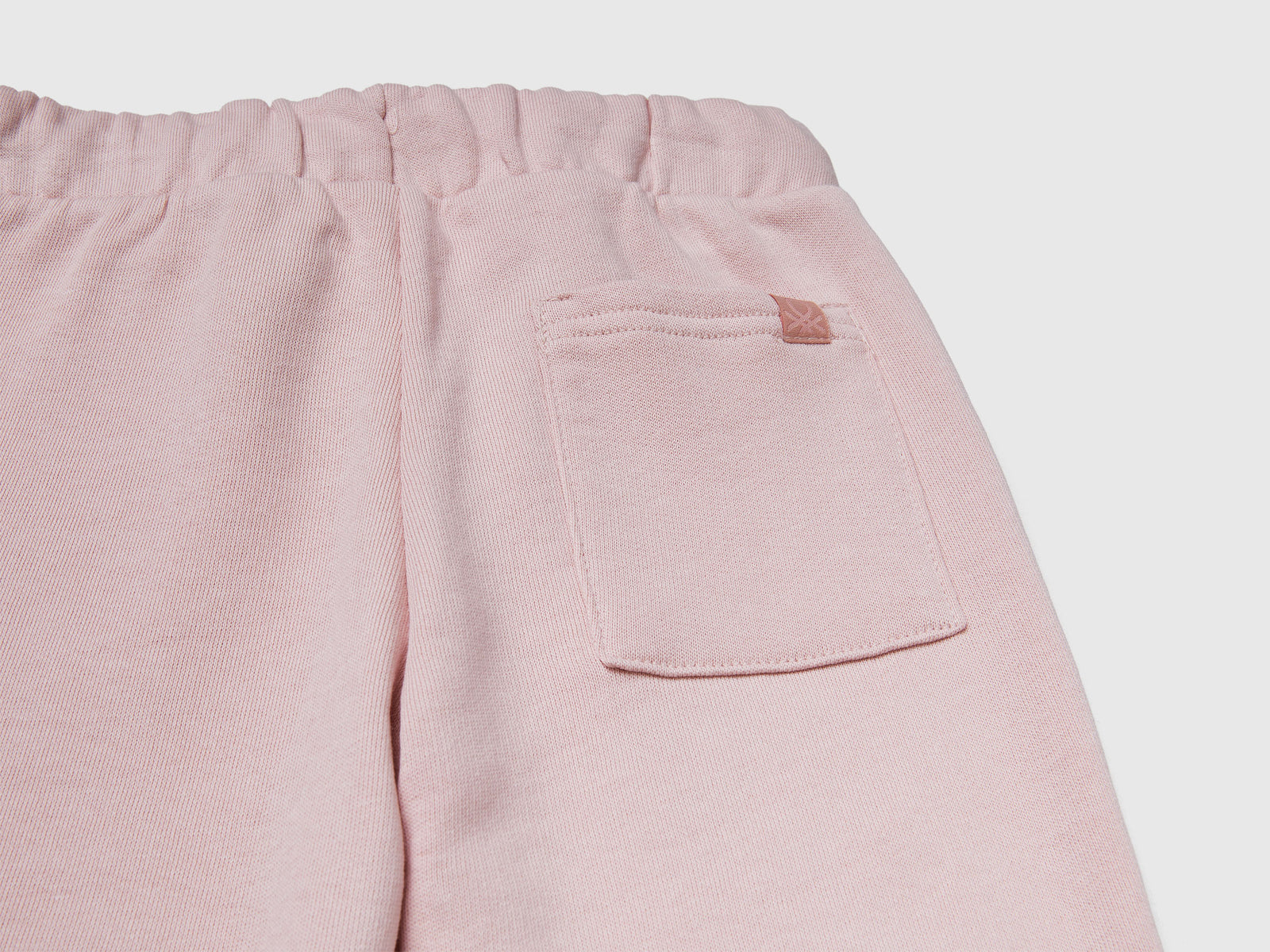 Tuta in felpa con logo da bimbo rosa tenue 3 | Benetton Outlet