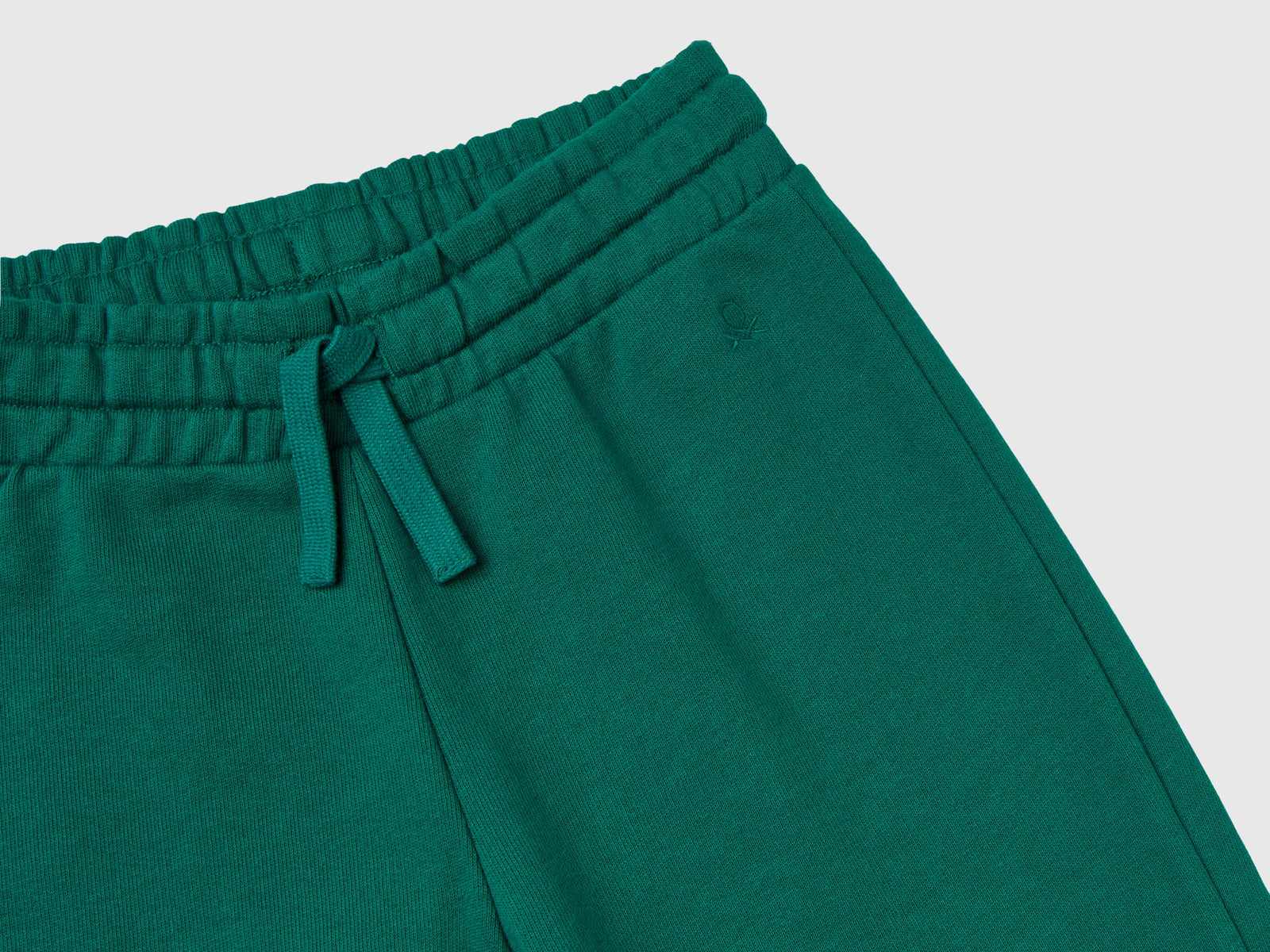 Pantaloni in felpa con logo da bambina verde scuro 3 | Benetton Outlet