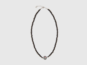 Collana di perle con fiore rosa