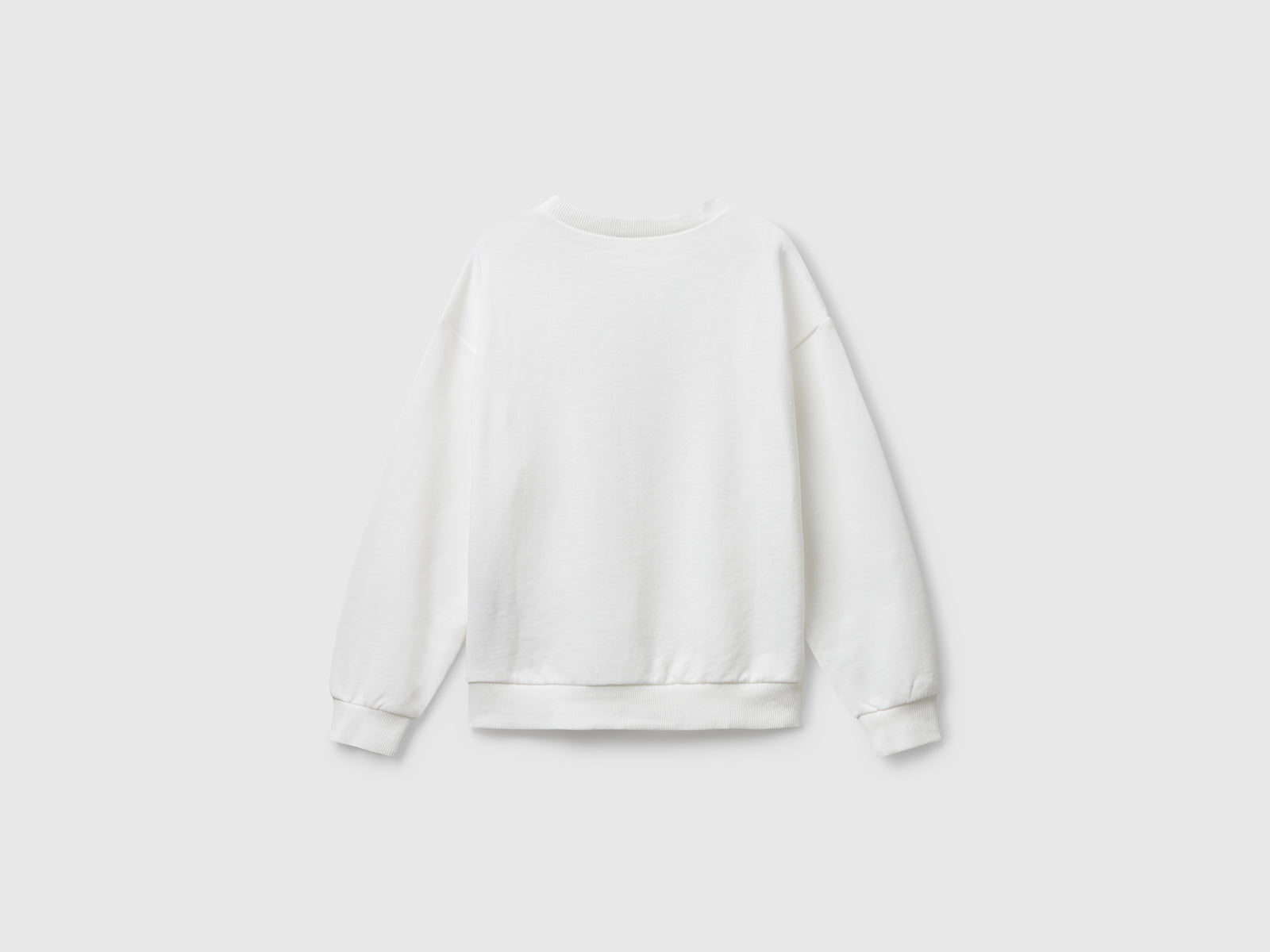 Felpa con stampa logo glitter da bambina bianco panna 2 | Benetton Outlet