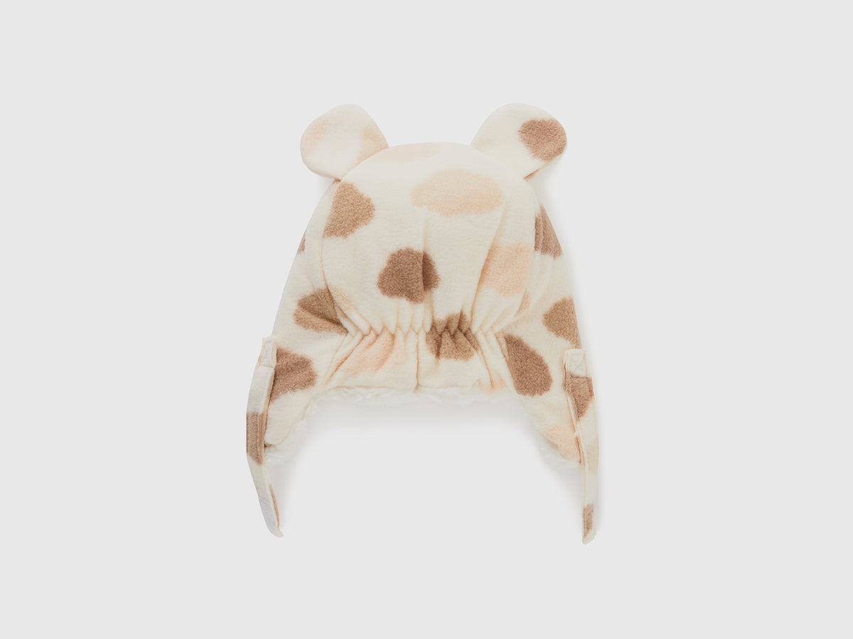 Cappello con paraorecchie e stampa nuvole