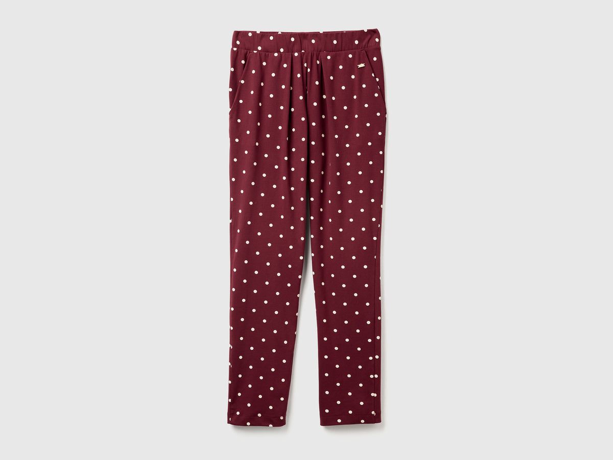 Pantaloni caldi a pois