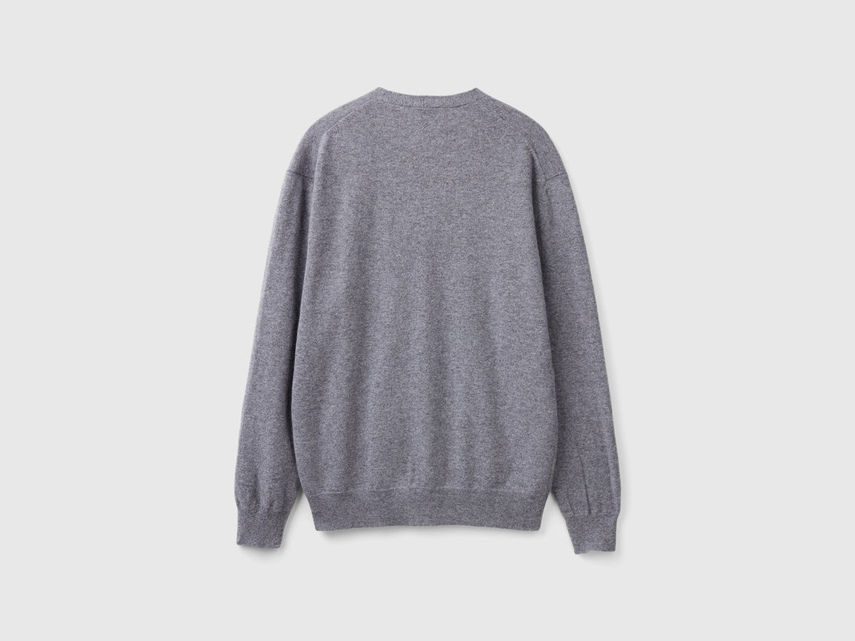 Cardigan scollo a V in pura lana Merino