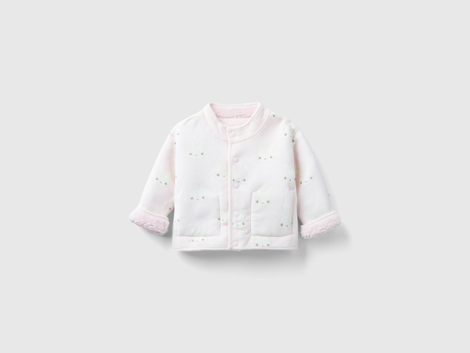 Giacchina reversibile con coniglietti da neonato rosa tenue 2 | Benetton Outlet