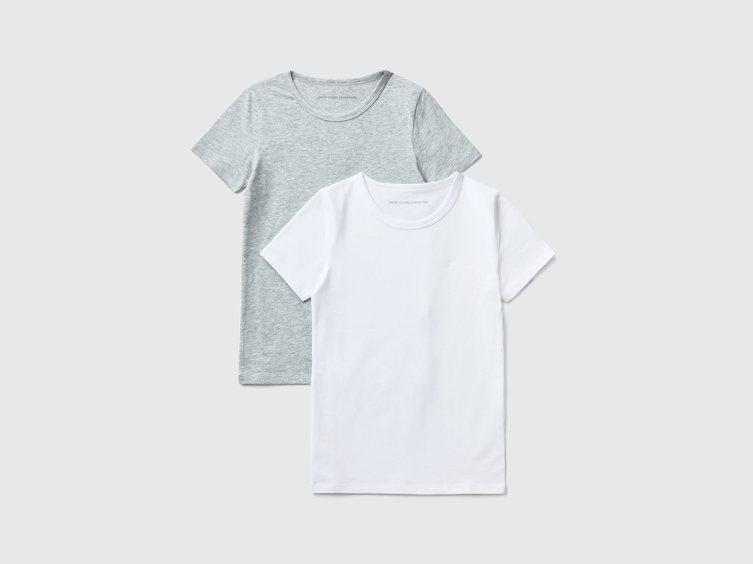 Due t-shirt in cotone stretch da bambino grigio chiaro | Benetton Outlet