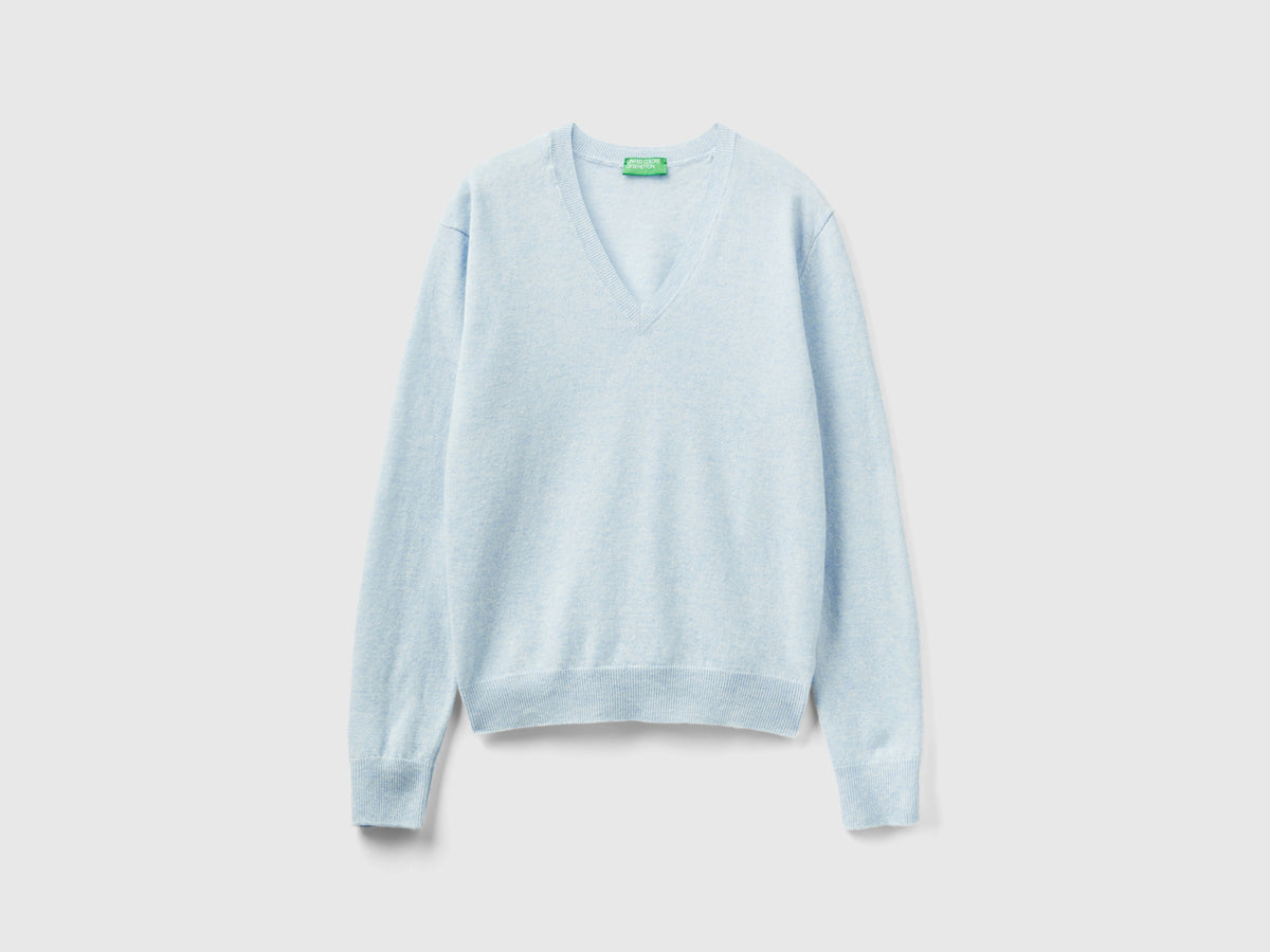Maglia con scollo a V celeste in pura lana Merino