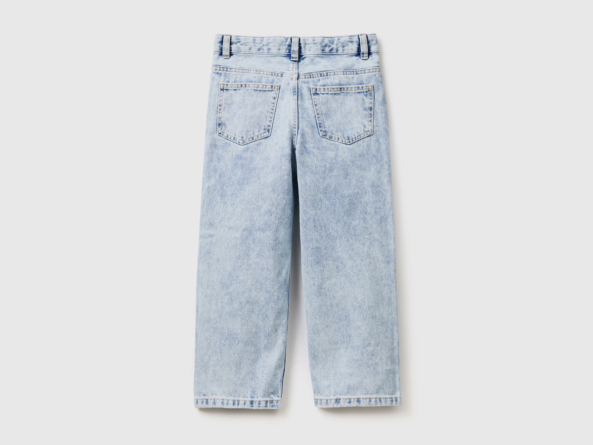 Pantaloni lunghi baggy fit in denim di puro cotone con rotture