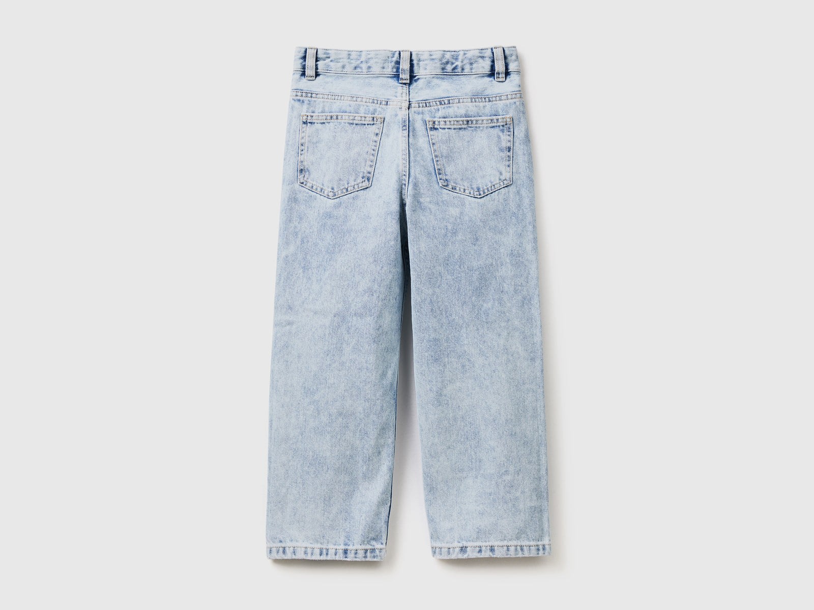 Pantaloni lunghi baggy fit in denim di puro cotone con rotture da bambino azzurro 2 | Benetton Outlet