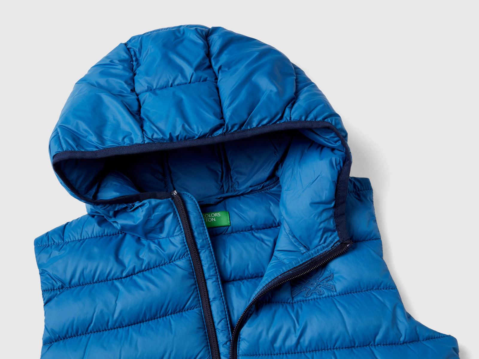 Gilet imbottito con cappuccio da bambino blu 3 | Benetton Outlet