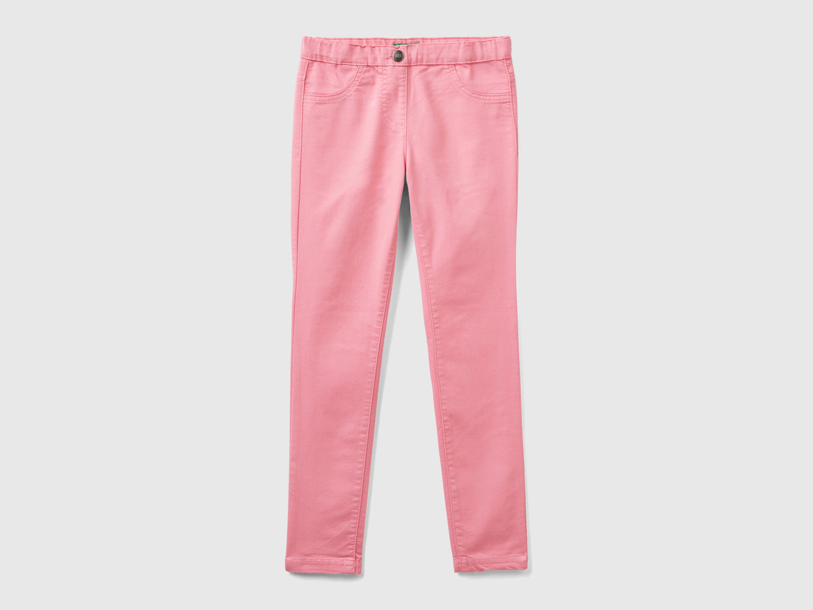 Pantaloni super skinny da bambina rosa | Benetton Outlet
