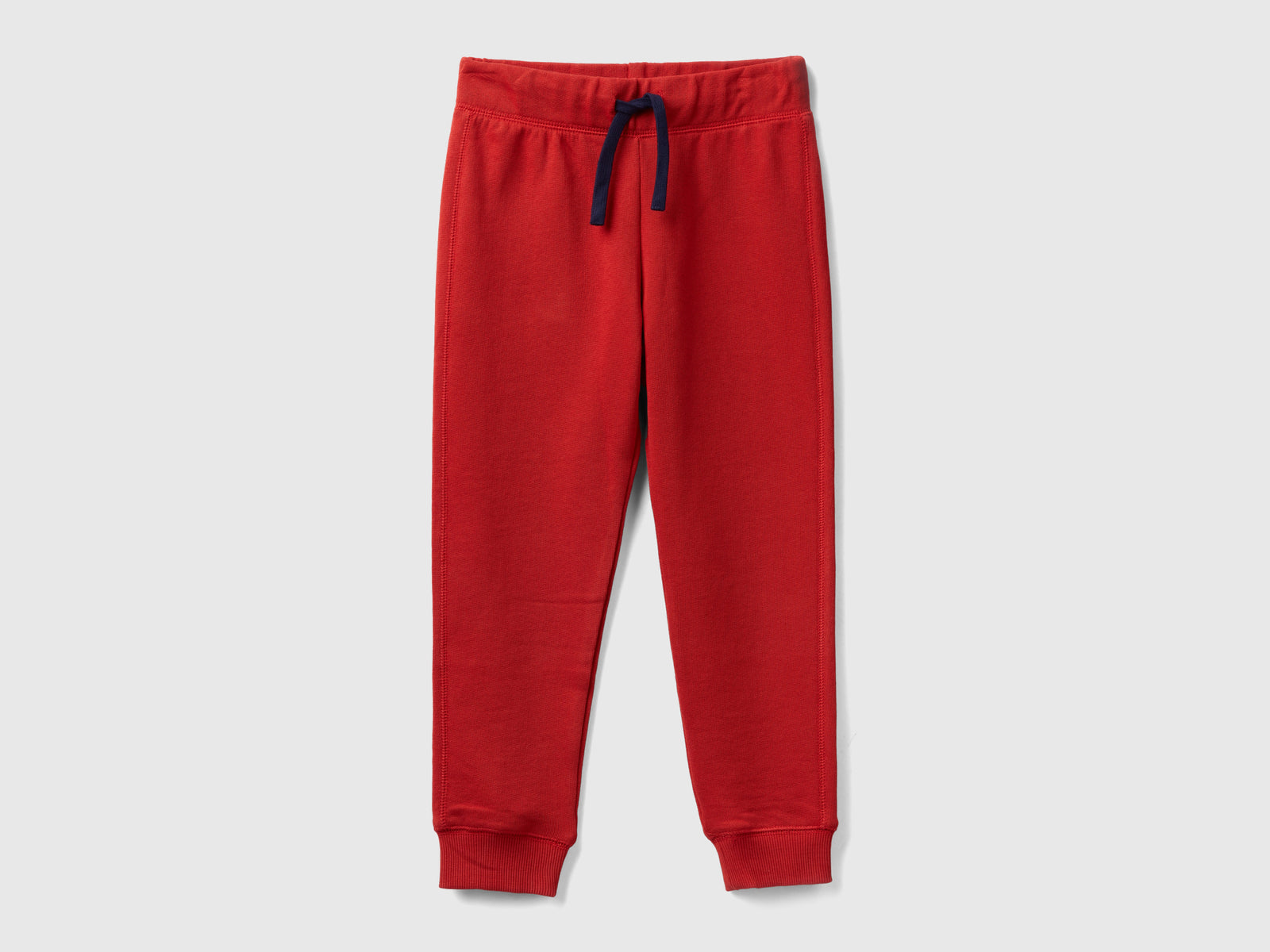 Pantaloni in felpa 100% cotone da bambino rosso mattone | Benetton Outlet