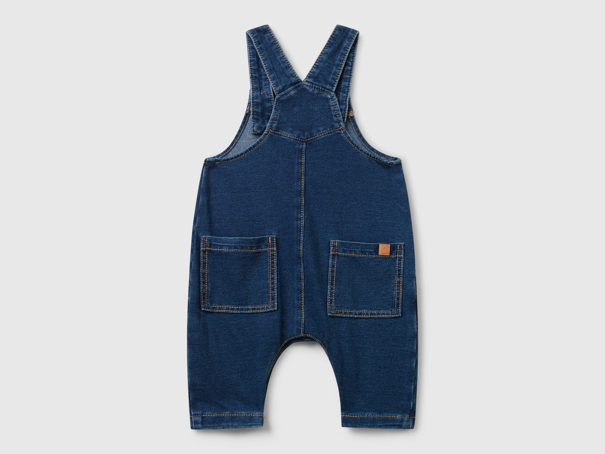 Salopette di jeans con tasche