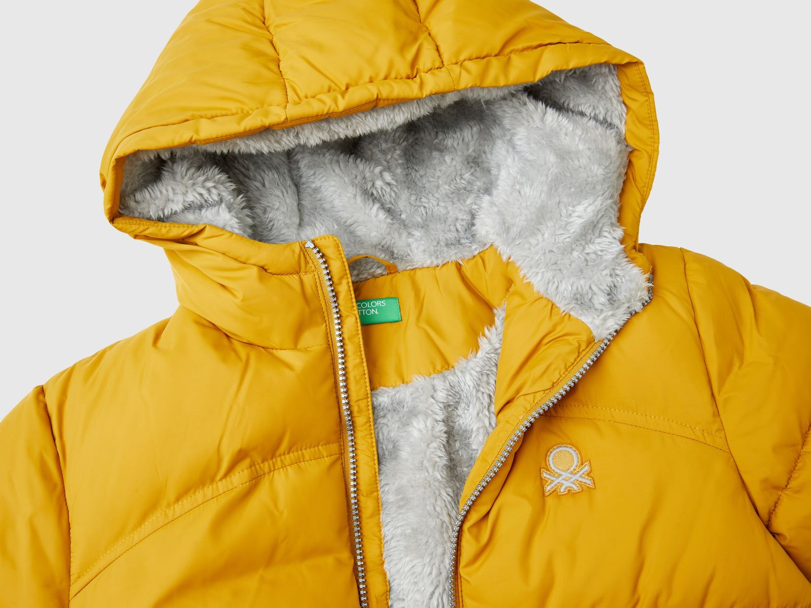 Giubbotto imbottito con interno orsetto da bambino senape 3 | Benetton Outlet