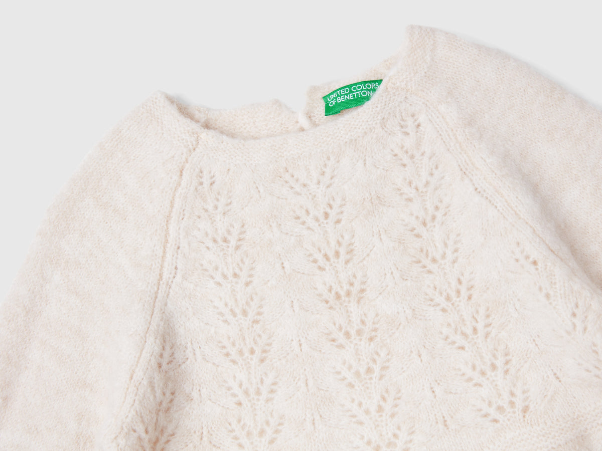 Abito in maglia con pizzo