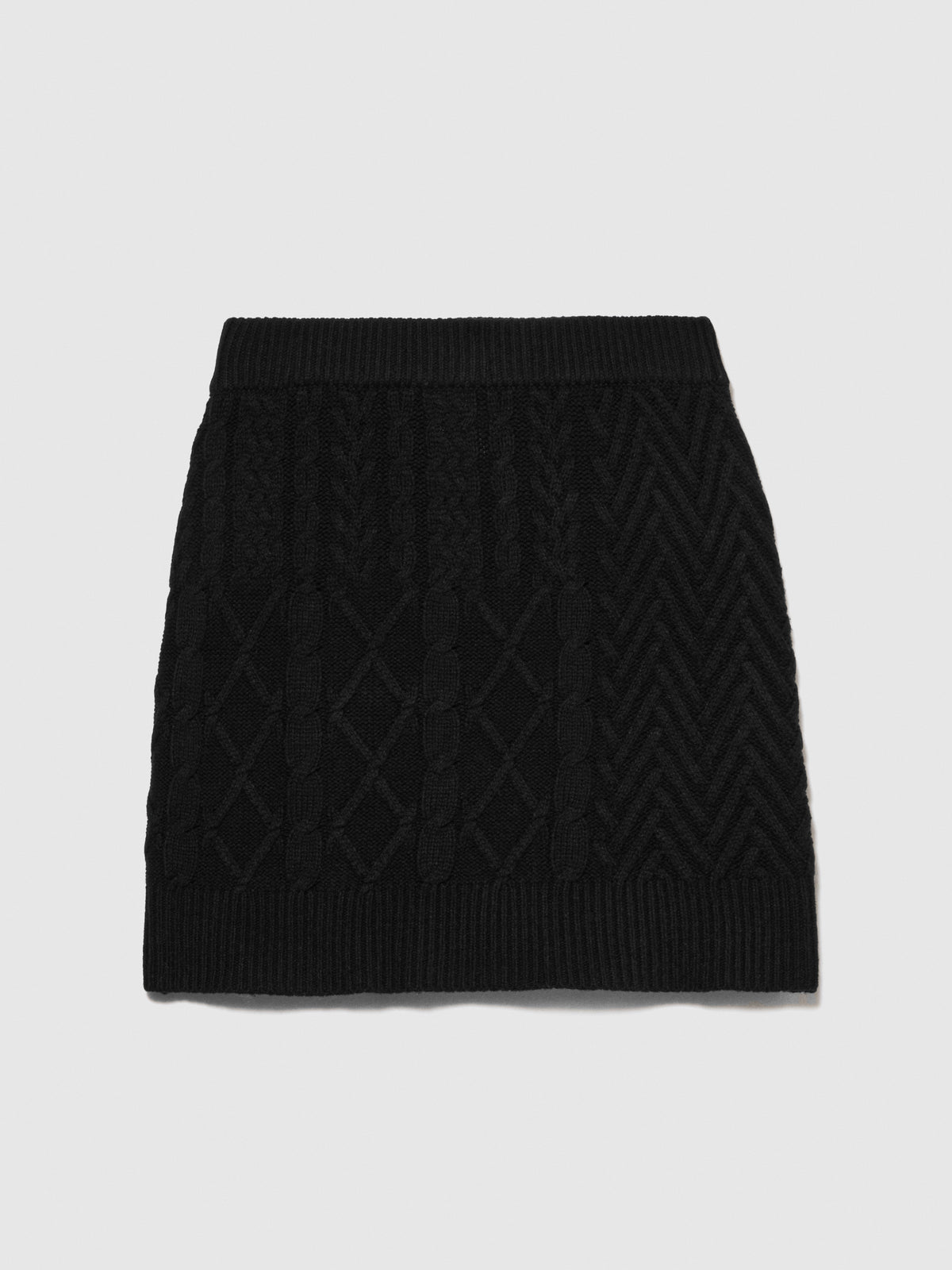 Minigonna in maglia con trecce