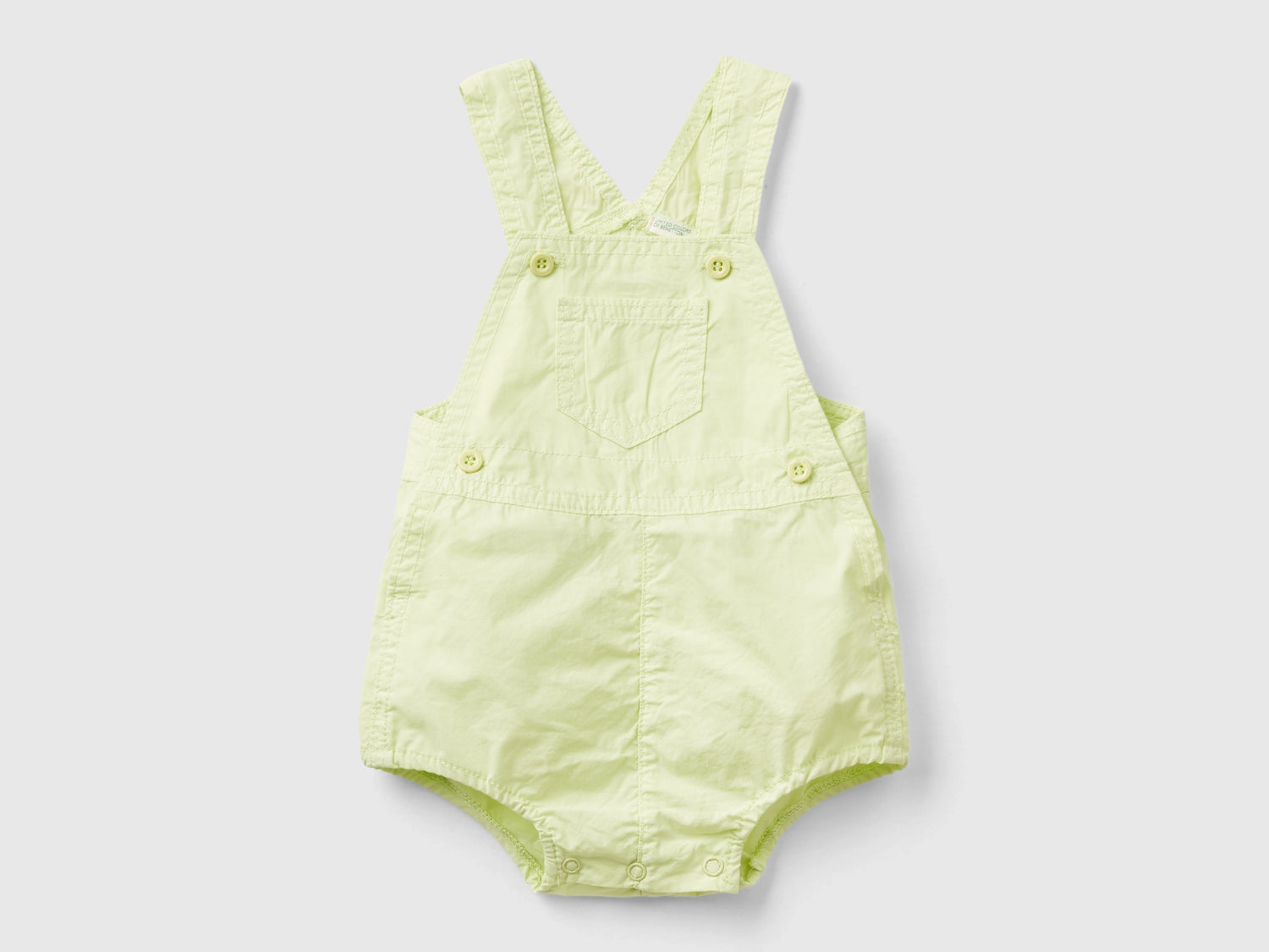 Pagliaccetto salopette in 100% cotone da neonato giallo | Benetton Outlet