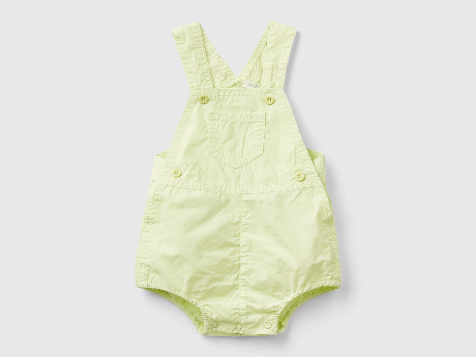 Pagliaccetto salopette in 100% cotone da neonato giallo | Benetton Outlet