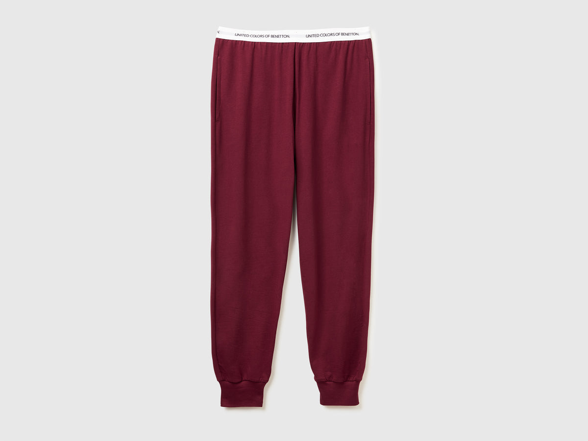 Pantaloni con elastico logato