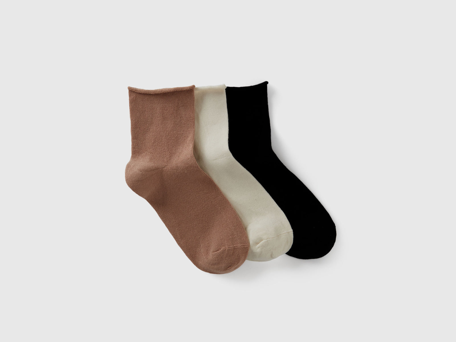 Tre paia di calzini lunghi da donna multi-color | Benetton Outlet