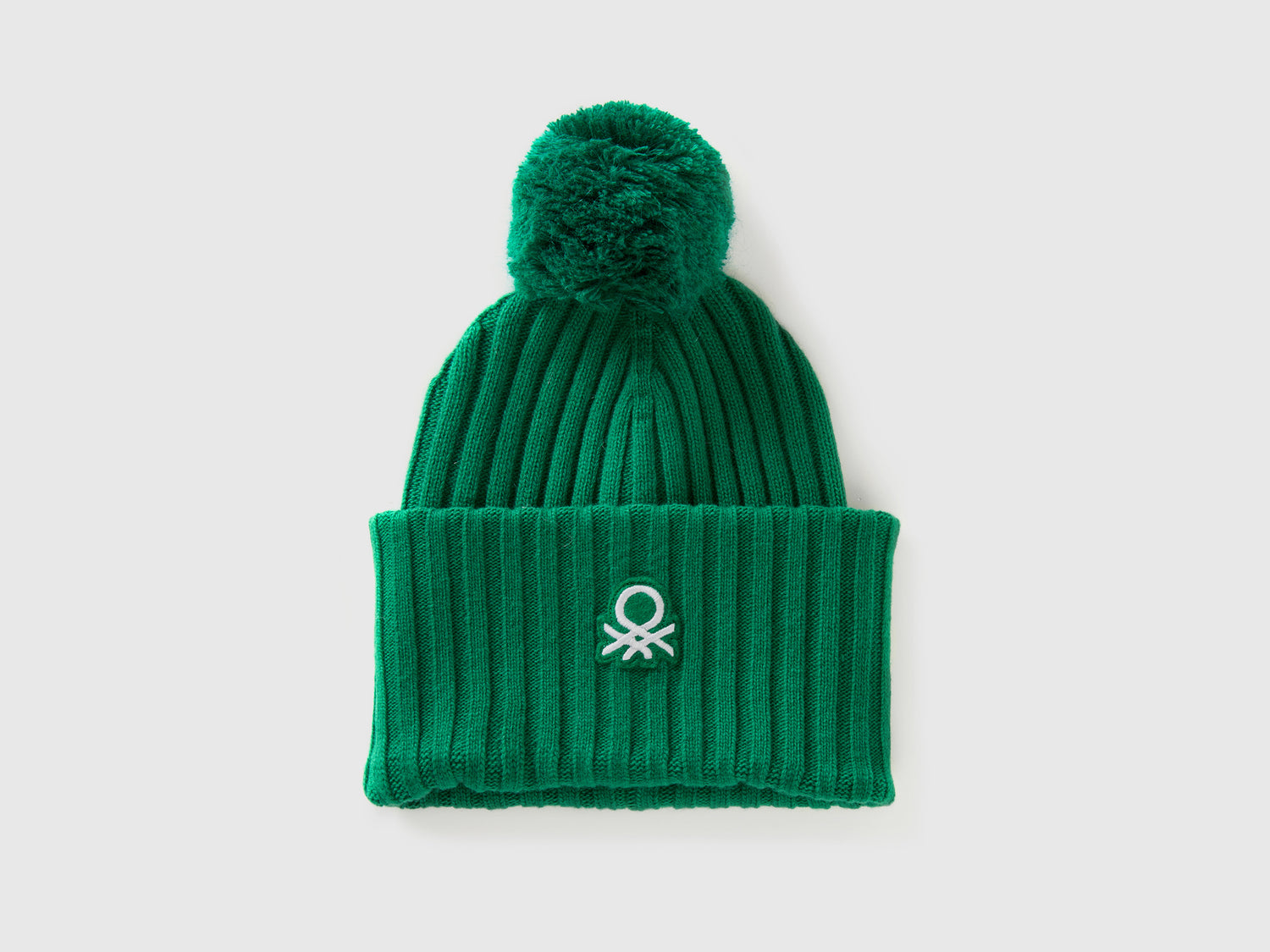 Berretto con logo e pom pom da donna verde | Benetton Outlet