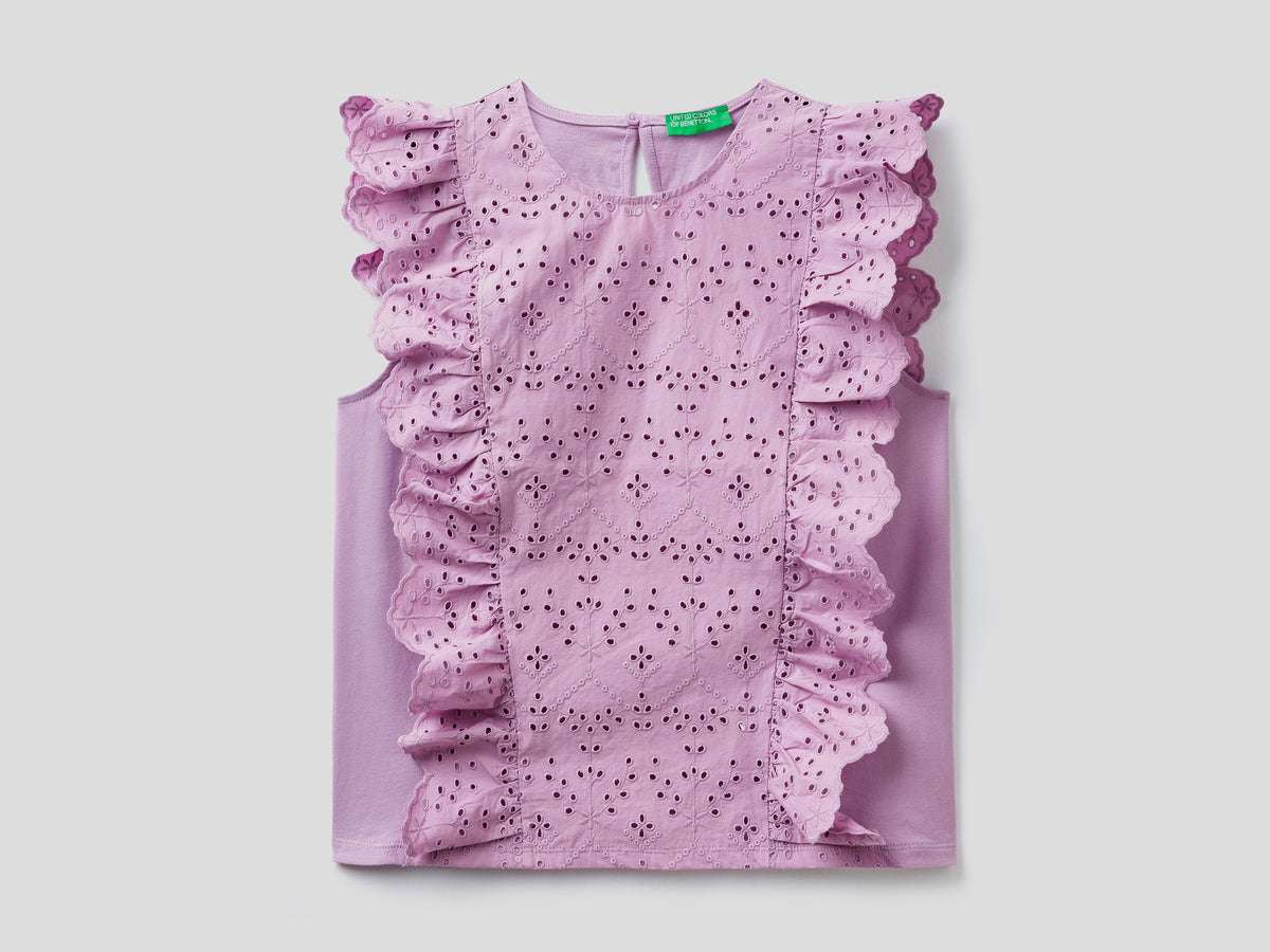 Blusa in sangallo con volant