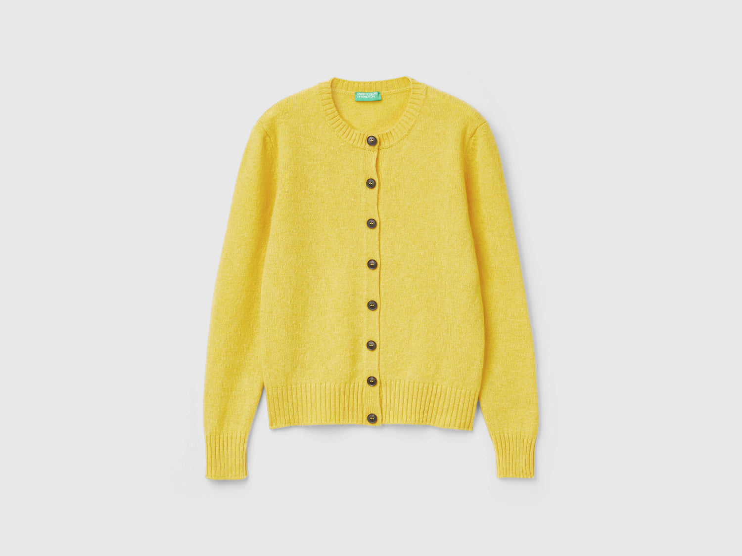 Cardigan in pura lana Shetland da donna senape | Benetton Outlet