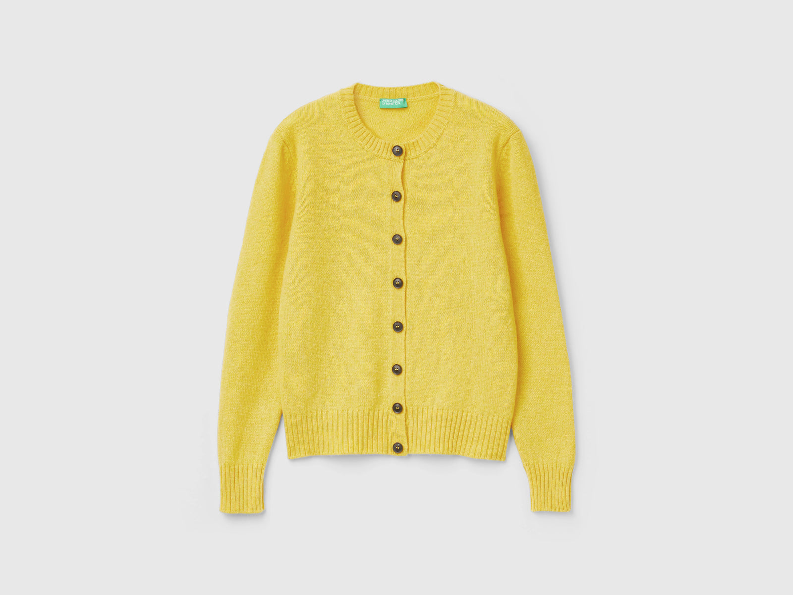 Cardigan in pura lana Shetland da donna senape | Benetton Outlet
