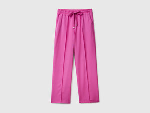 Pantaloni lunghi fluidi modello jogger in misto viscosa