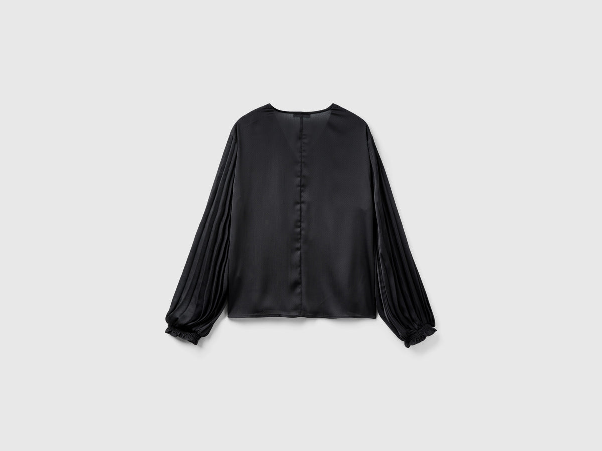 Blusa con manica lunga plissettata