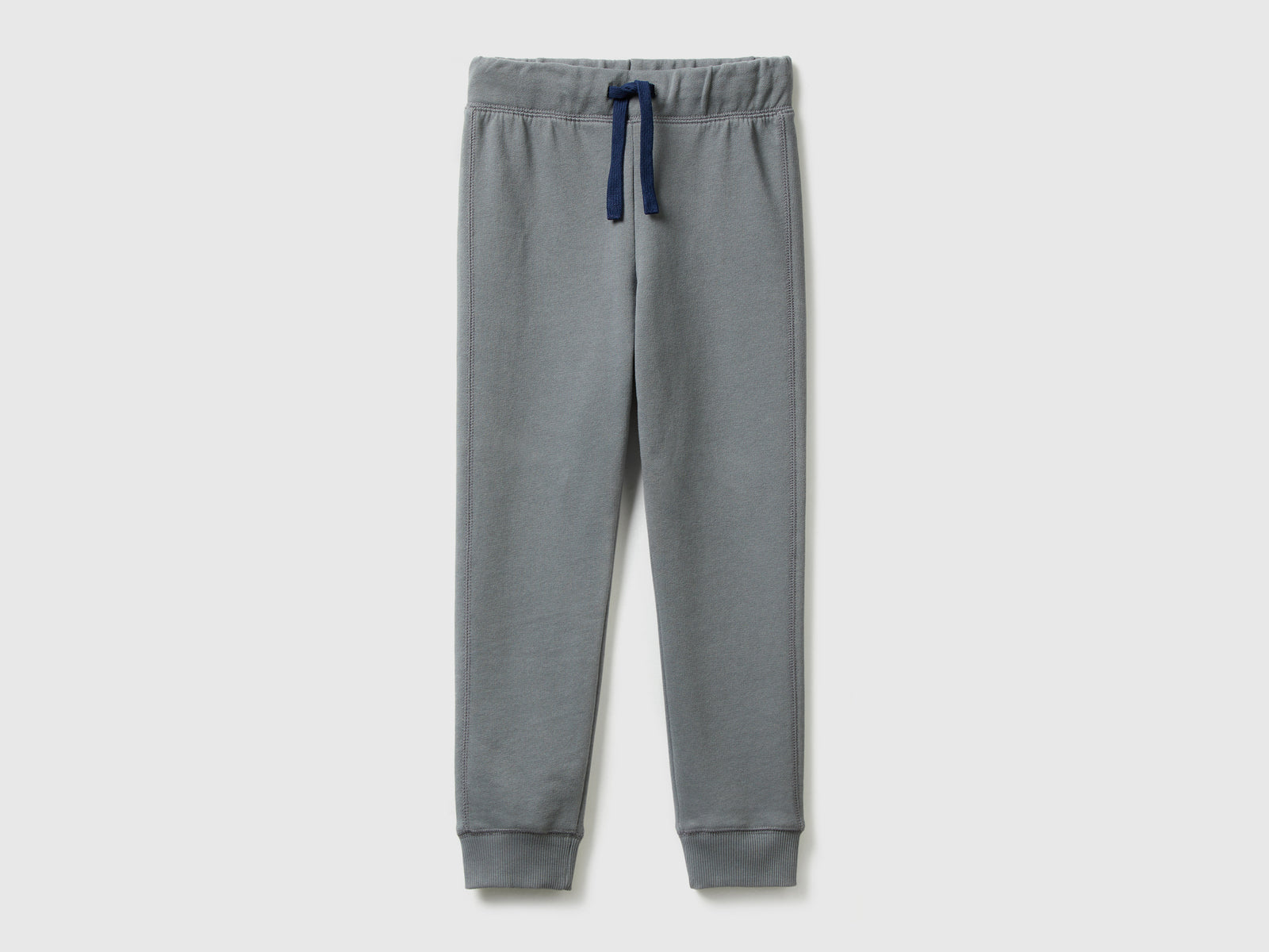 Pantaloni in felpa 100% cotone da bambino grigio scuro | Benetton Outlet