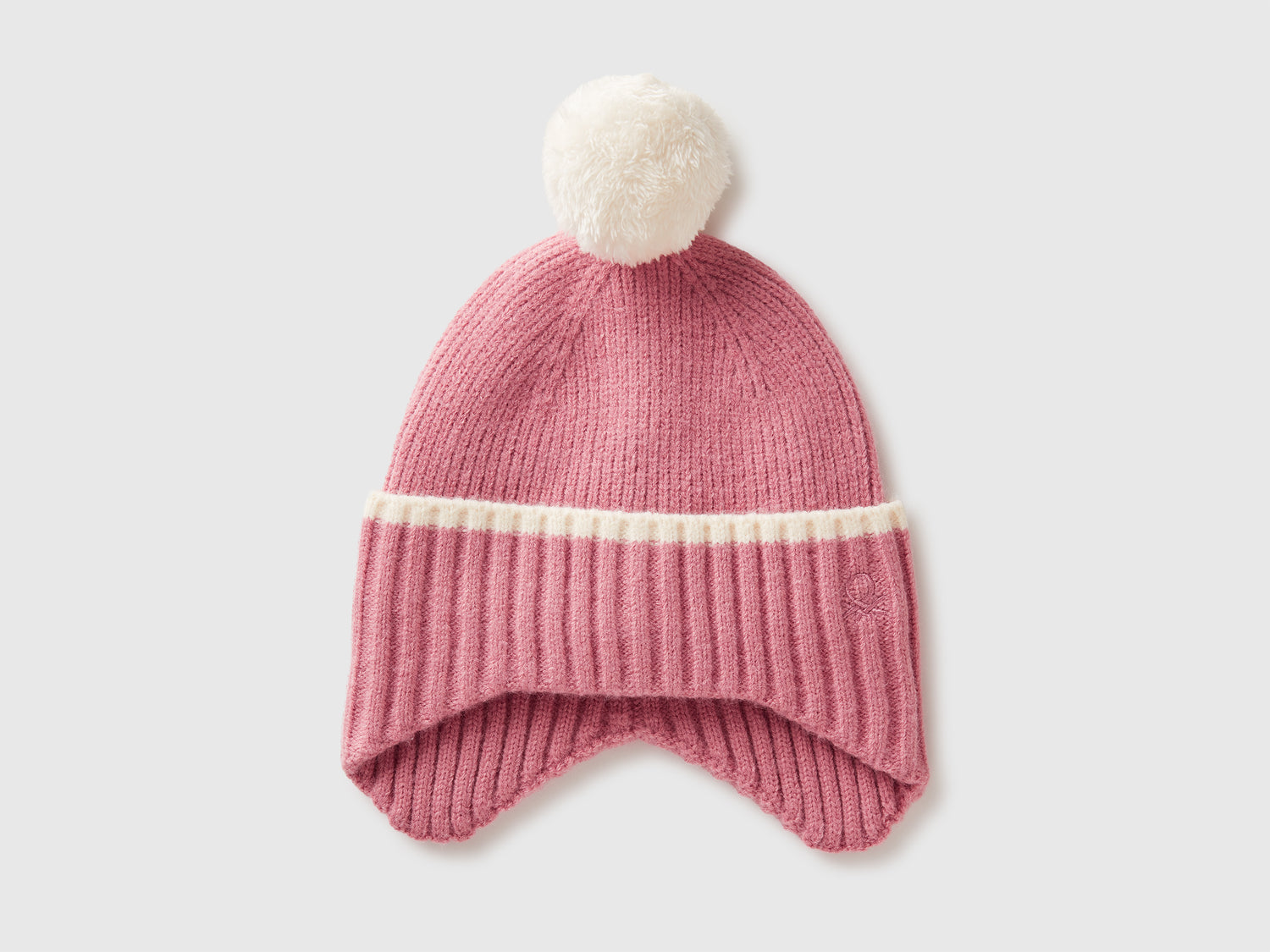 Cappello con paraorecchie e pom pom da bimbo rosa | Benetton Outlet