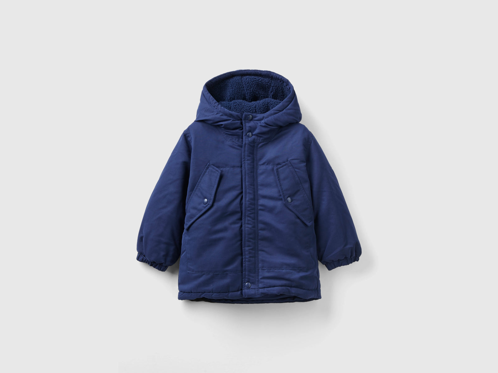 Parka imbottito con tasche da bimbo blu scuro | Benetton Outlet