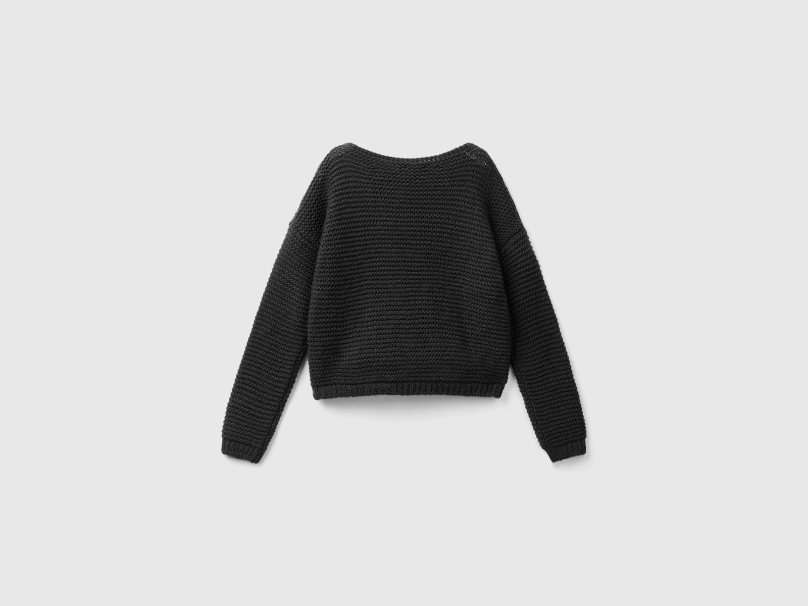 Maglia con trecce in misto lana da bambina nero 2 | Benetton Outlet